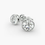 Load image into Gallery viewer, Round Diamond Bezel‑Set Stud Earrings 0.50–10.00 Ctw in 10K/14K/18K White or Yellow Gold