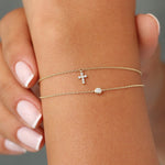 Load image into Gallery viewer, Minimalist Cross Bracelet in Solid Gold with Lab-Grown Diamonds – 0.06 Carat Total Weight