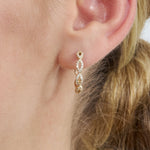 Load image into Gallery viewer, Twisted Hoop Lab-Grown Diamond Earrings 0.23 CTW – 80 Round Stones | 10K, 14K, 18K Gold | IGI Certified
