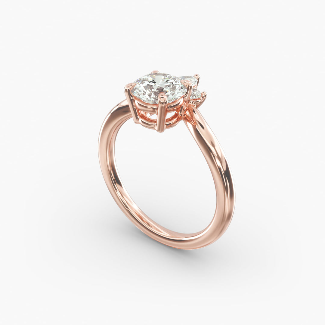 14K Gold Round And Pear Three Stone Curved Diamond Ring