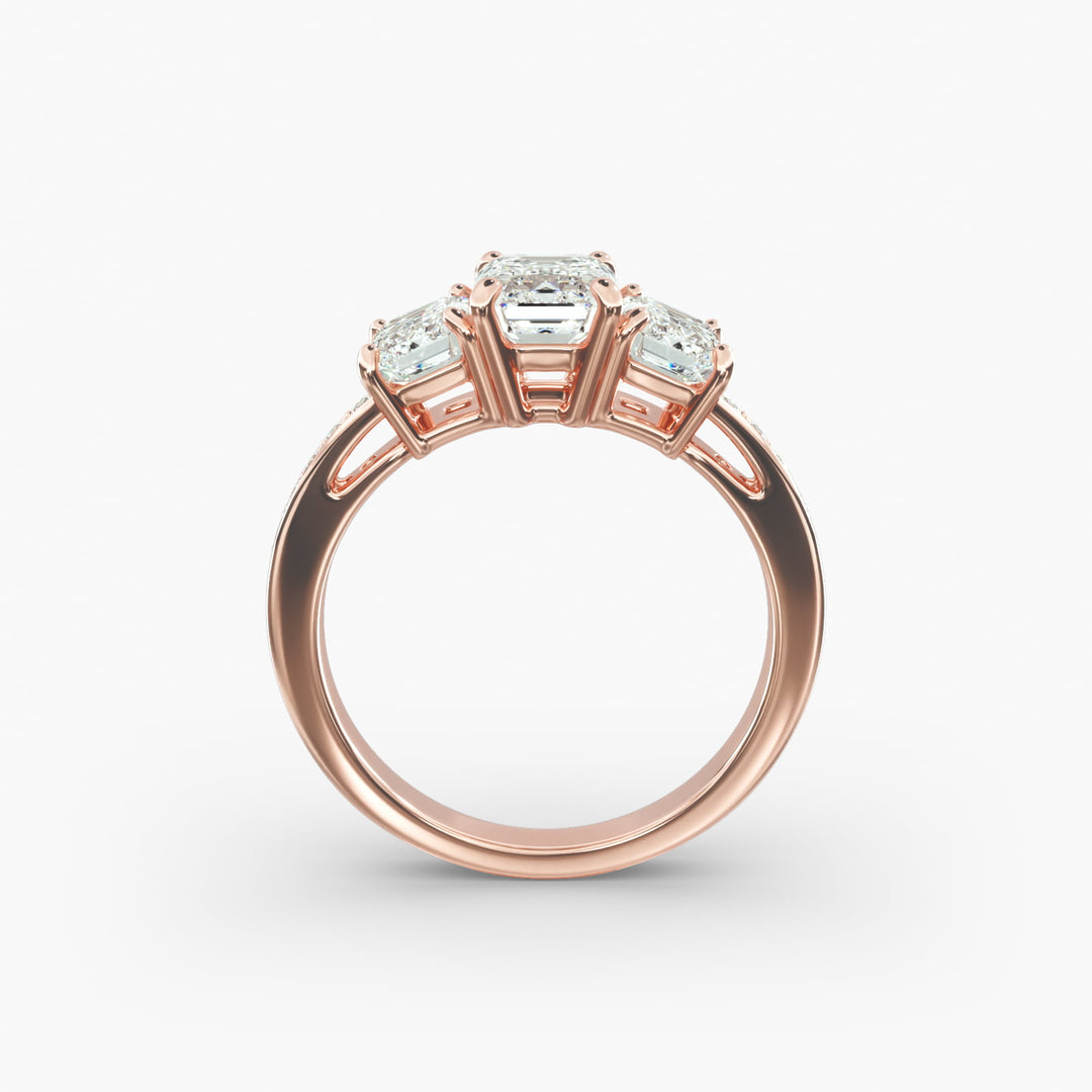 18K Gold Emerald And Round Shape Three Stone Engagement Ring