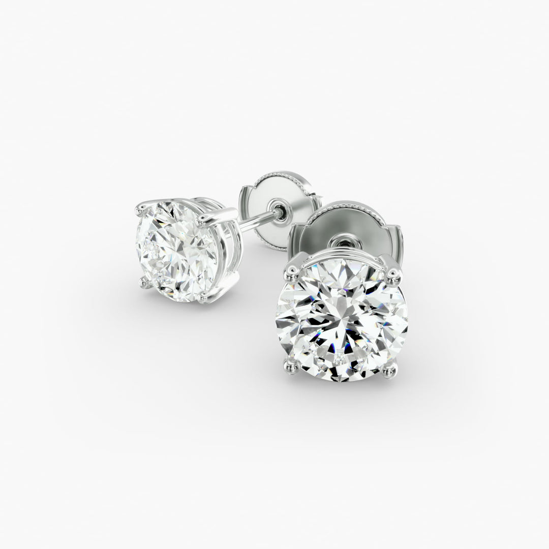 Round Diamond Four‑Prong Stud Earrings 0.50–10.00 CT in 10K/14K/18K White or Yellow Gold