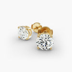 Load image into Gallery viewer, Round Diamond Four‑Prong Stud Earrings 0.50–10.00 CT in 10K/14K/18K White or Yellow Gold

