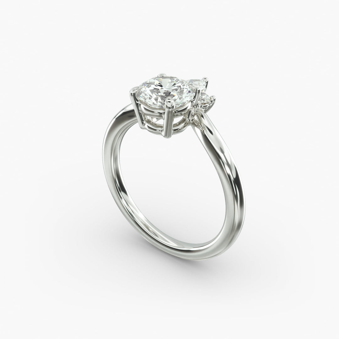 14K Gold Round And Pear Three Stone Curved Diamond Ring