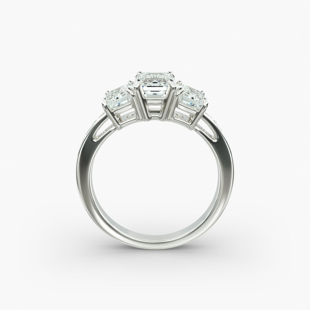18K Gold Emerald And Round Shape Three Stone Engagement Ring
