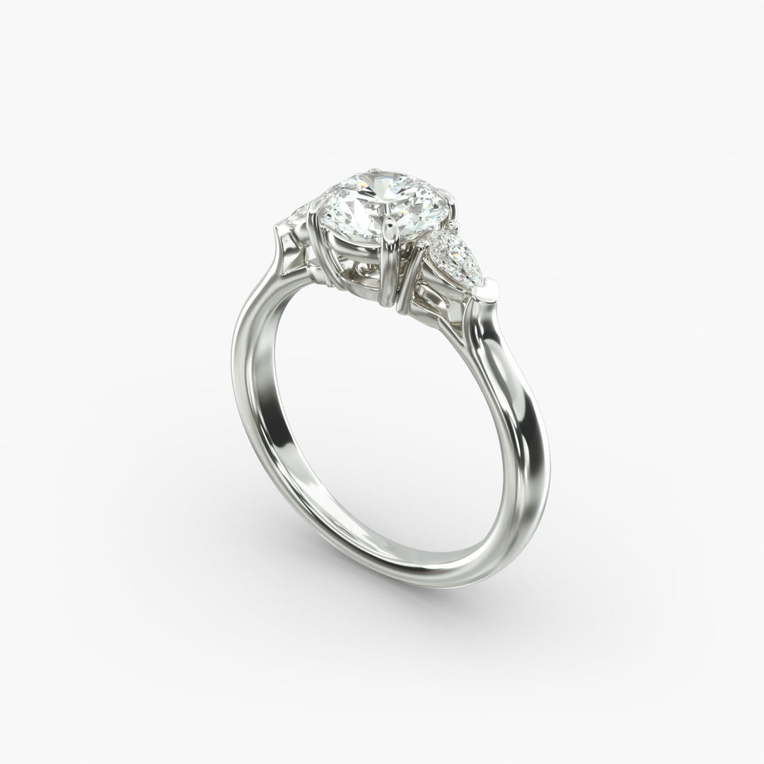 10K Gold Three Stone Round With Pear Shaped Diamond Engagement Ring