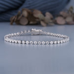 Load image into Gallery viewer, 3.74 CTW Round Lab-Grown Diamond Three Prong Tennis Bracelet in 14K White Gold – IGI Certified