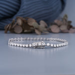 Load image into Gallery viewer, 3.74 CTW Round Lab-Grown Diamond Three Prong Tennis Bracelet in 14K White Gold – IGI Certified