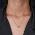 Load image into Gallery viewer, 10K White Gold Emerald Cut Diamond Bezel Solitaire Pendant Necklace
