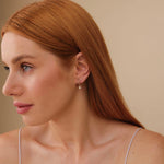 Load image into Gallery viewer, Celeste Star Drop Lab-Grown Diamond Huggie Earrings 0.06 CTW – 22 Round Stones | 10K, 14K, 18K Gold | IGI Certified
