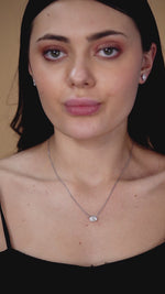 Load and play video in Gallery viewer, 1.47 CTW Oval Lab-Grown Diamond Stud Earrings in 14K White Gold – IGI Certified
