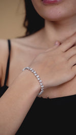 Load and play video in Gallery viewer, 11.30 CTW Pear Lab-Grown Diamond Tennis Bracelet in 14K White Gold – IGI Certified
