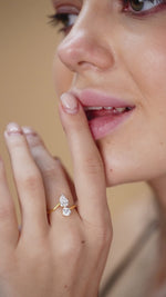 Load and play video in Gallery viewer, 1.25 CTW Toi Et Moi Round And Pear Lab-Grown Diamond Ring in 14K Yellow Gold – IGI Certified
