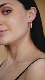 Load and play video in Gallery viewer, 10K Gold Lily Long Drop Diamond Earrings
